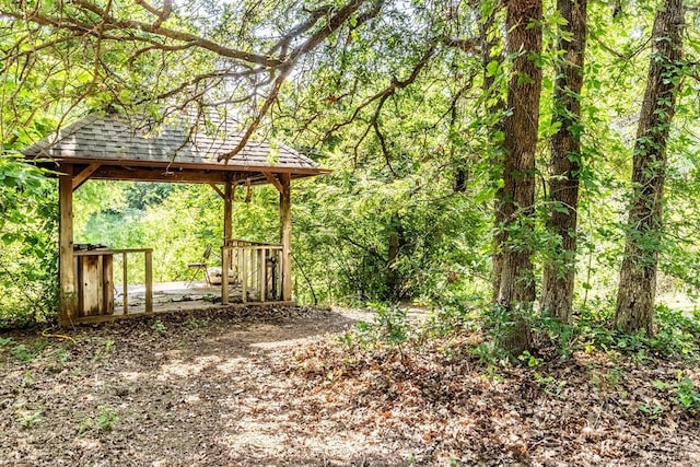 6540 S Donna Ln, Oklahoma City, OK 73150 - view of yard with a gazebo and a forest view