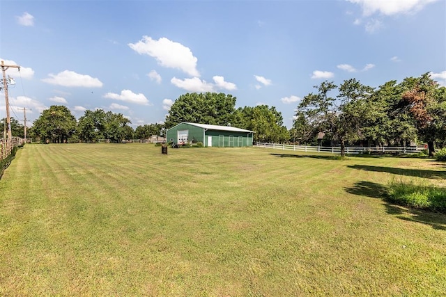 6540 S Donna Ln, Oklahoma City, OK 73150 - view of yard featuring an outbuilding, an outdoor structure, and a view of rural / pastoral area