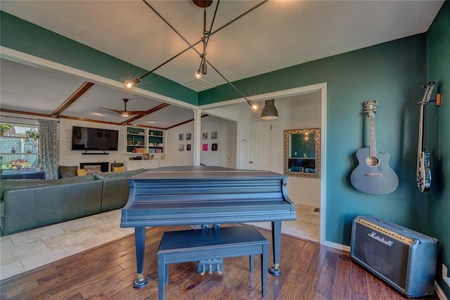 6348 Hyde Park Dr, Oklahoma City, OK 73162 - interior space featuring ceiling fan, hardwood / wood-style floors, and a large fireplace