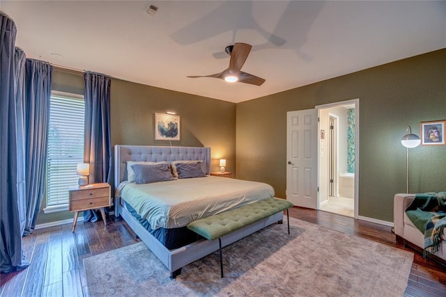 6348 Hyde Park Dr, Oklahoma City, OK 73162 - bedroom featuring wood finished floors, a ceiling fan, ensuite bathroom, and a textured wall