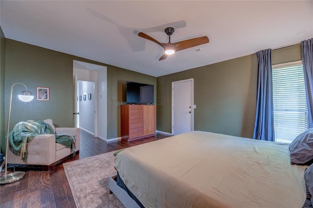 6348 Hyde Park Dr, Oklahoma City, OK 73162 - bedroom with dark wood-style flooring and ceiling fan