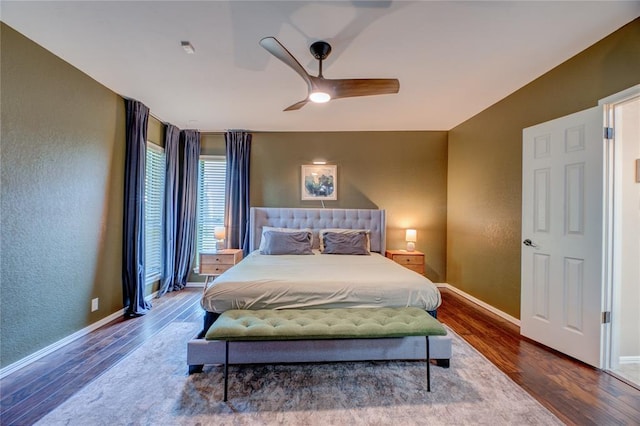 6348 Hyde Park Dr, Oklahoma City, OK 73162 - bedroom featuring wood finished floors, ceiling fan, and a textured wall