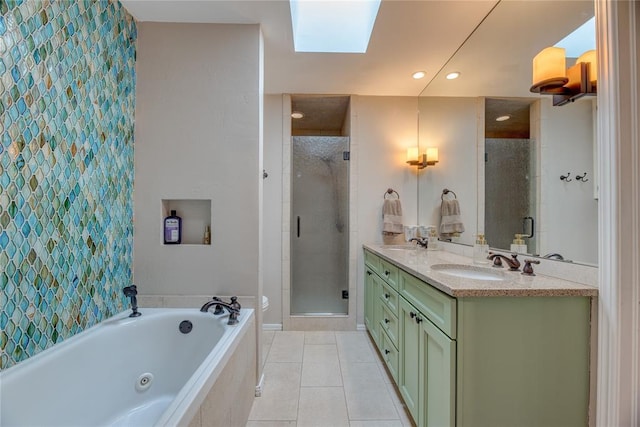 6348 Hyde Park Dr, Oklahoma City, OK 73162 - bathroom featuring a shower stall, double vanity, a tub with jets, tile patterned floors, and recessed lighting
