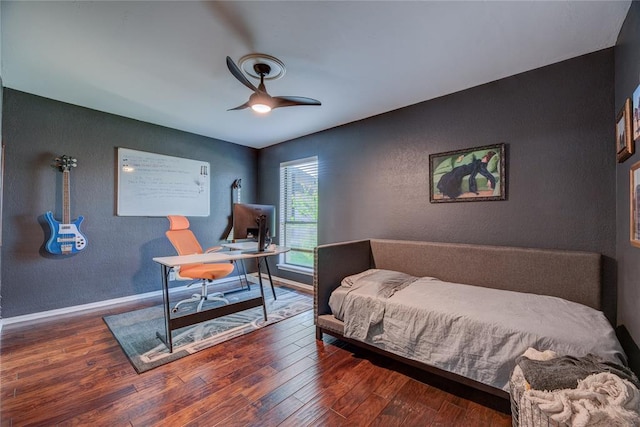 6348 Hyde Park Dr, Oklahoma City, OK 73162 - bedroom featuring wood finished floors, a desk, and ceiling fan