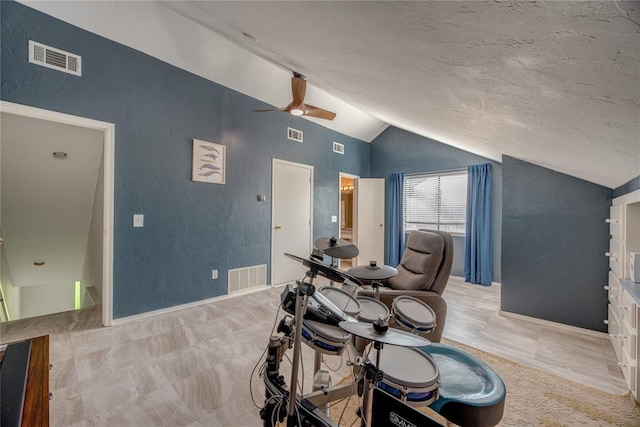 6348 Hyde Park Dr, Oklahoma City, OK 73162 - dining room with lofted ceiling, ceiling fan, and a textured wall