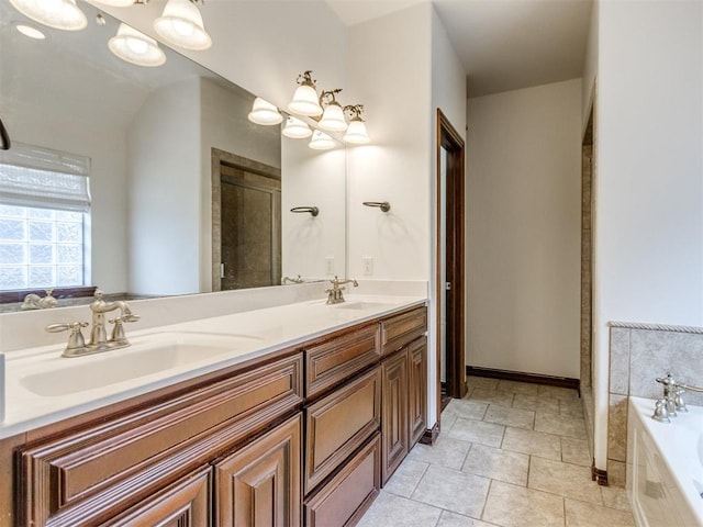 17104 Wales Green Ave, Edmond, OK 73012 - bathroom with double vanity, a garden tub, and a tile shower