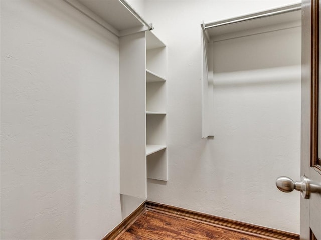 17104 Wales Green Ave, Edmond, OK 73012 - spacious closet featuring wood finished floors