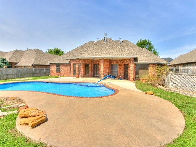 17104 Wales Green Ave, Edmond, OK 73012 - view of swimming pool featuring a patio, a fenced backyard, and a pool with connected hot tub