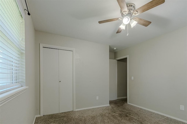 5717 NW 31st Ter, Oklahoma City, OK 73122 - unfurnished bedroom featuring carpet flooring, a closet, and a ceiling fan
