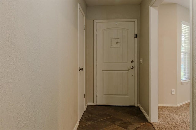 5717 NW 31st Ter, Oklahoma City, OK 73122 - hallway featuring baseboards