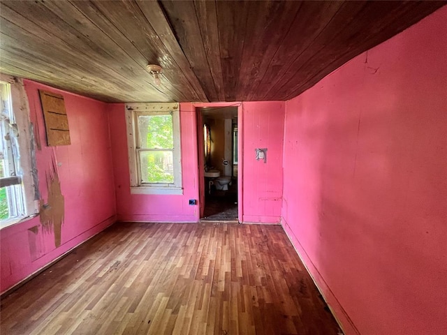 307 W Walnut Ave, Seminole, OK 74868 - unfurnished room with wood finished floors and wood ceiling