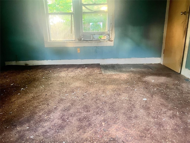 307 W Walnut Ave, Seminole, OK 74868 - spare room with baseboards