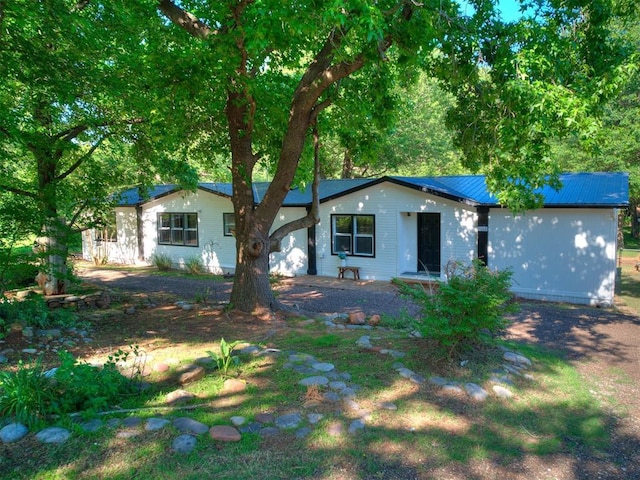 9200 Hollow Rd, Newalla, OK 74857 - ranch-style home with a metal roof