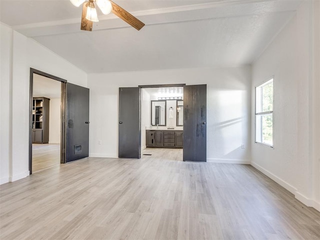 9200 Hollow Rd, Newalla, OK 74857 - unfurnished living room featuring light wood-style floors and ceiling fan