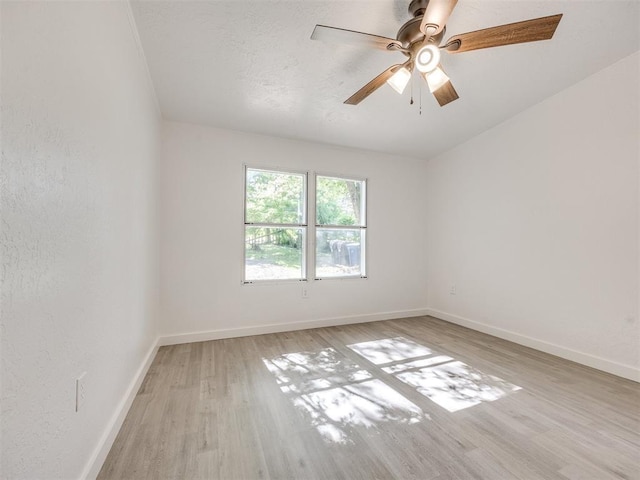 9200 Hollow Rd, Newalla, OK 74857 - empty room featuring light wood finished floors and ceiling fan