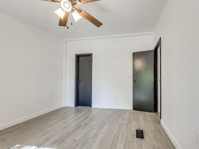9200 Hollow Rd, Newalla, OK 74857 - empty room with light wood finished floors and ceiling fan