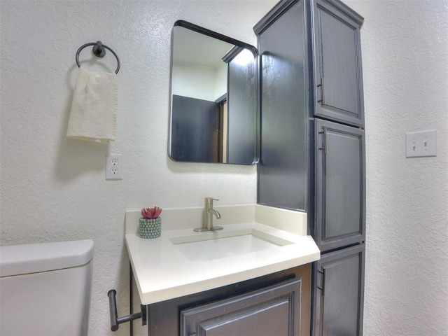 9200 Hollow Rd, Newalla, OK 74857 - half bathroom with a textured wall and vanity