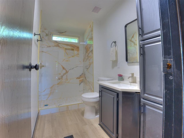 9200 Hollow Rd, Newalla, OK 74857 - full bath featuring vanity, a marble finish shower, and wood finished floors