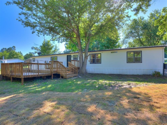 9200 Hollow Rd, Newalla, OK 74857 - back of property featuring a deck and a lawn