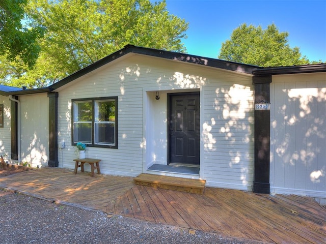 9200 Hollow Rd, Newalla, OK 74857 - property entrance with a deck