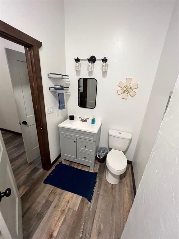 115008 S 4292nd Rd, Porum, OK 74455 - bathroom featuring wood finished floors and vanity