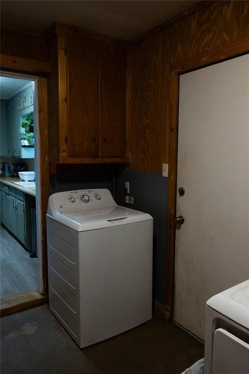 1702 W Boyd St, Norman, OK 73069 - washroom featuring cabinet space and independent washer and dryer