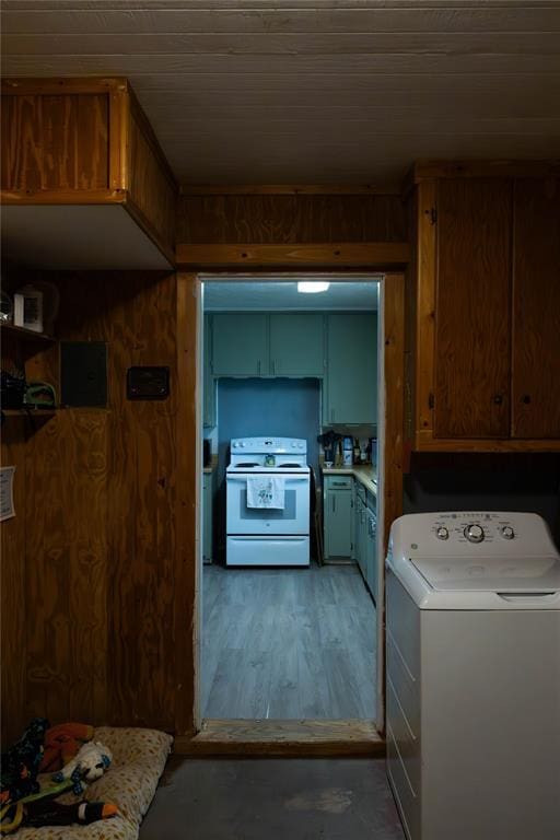 1702 W Boyd St, Norman, OK 73069 - kitchen with washer / clothes dryer, white electric range, and light countertops