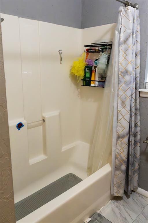 1702 W Boyd St, Norman, OK 73069 - full bathroom featuring shower / tub combo with curtain and marble finish floors