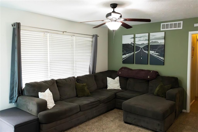 1702 W Boyd St, Norman, OK 73069 - living room with ceiling fan and carpet flooring