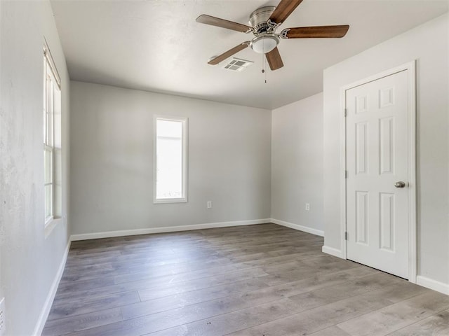 321 W Farrall Ave, Shawnee, OK 74801 - unfurnished room with ceiling fan and wood finished floors