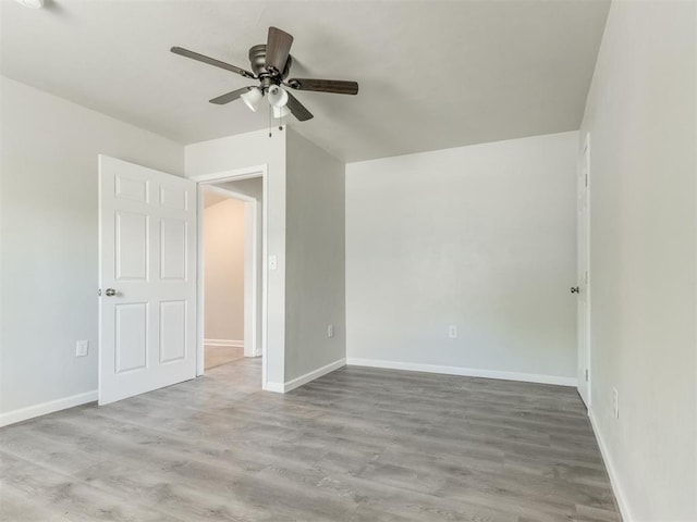 321 W Farrall Ave, Shawnee, OK 74801 - unfurnished room featuring ceiling fan and wood finished floors