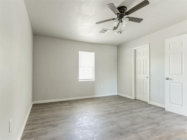 321 W Farrall Ave, Shawnee, OK 74801 - unfurnished room featuring ceiling fan and wood finished floors