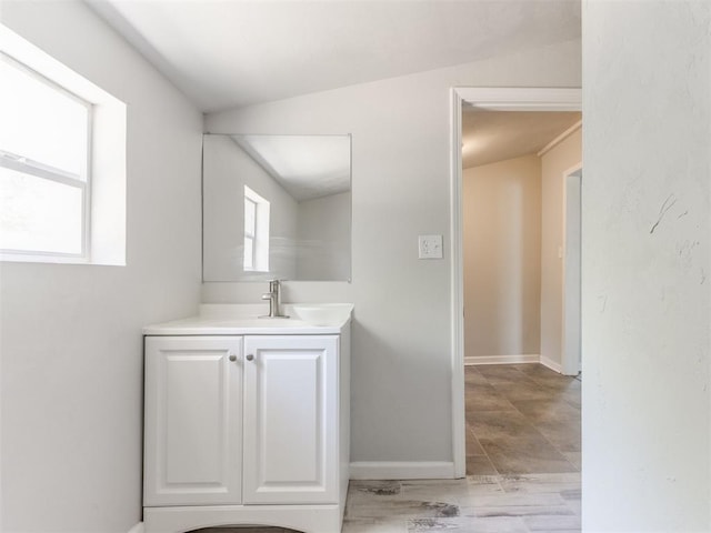 321 W Farrall Ave, Shawnee, OK 74801 - bathroom with vanity and baseboards