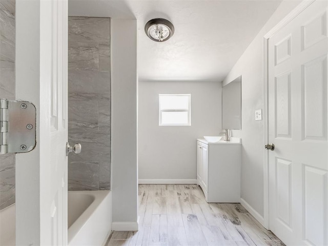 321 W Farrall Ave, Shawnee, OK 74801 - full bathroom with vanity, wood finished floors, and tub / shower combination