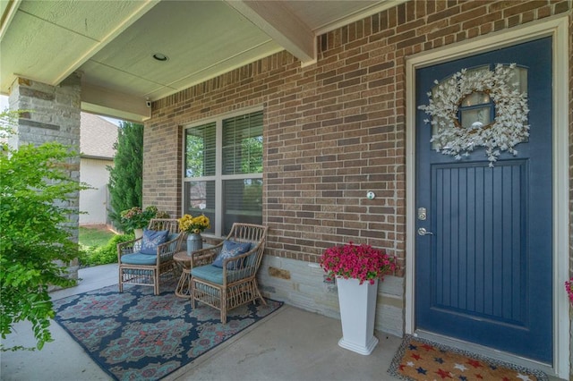 508 Mirano Ln, Edmond, OK 73034 - entrance to property with covered porch and brick siding