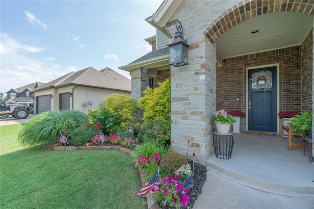 508 Mirano Ln, Edmond, OK 73034 - doorway to property featuring a lawn, brick siding, a garage, and stone siding