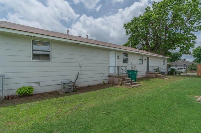 4720 S Youngs Blvd, Oklahoma City, OK 73119 - back of property featuring a lawn