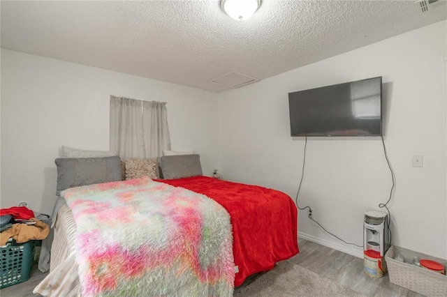 4720 S Youngs Blvd, Oklahoma City, OK 73119 - bedroom with attic access and a textured ceiling