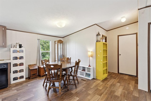 4040 Logan Hills Dr, Guthrie, OK 73044 - dining room with ornamental molding and light wood-type flooring
