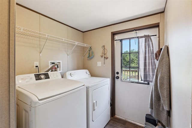 4040 Logan Hills Dr, Guthrie, OK 73044 - laundry room with washing machine and dryer, dark wood-type flooring, and crown molding