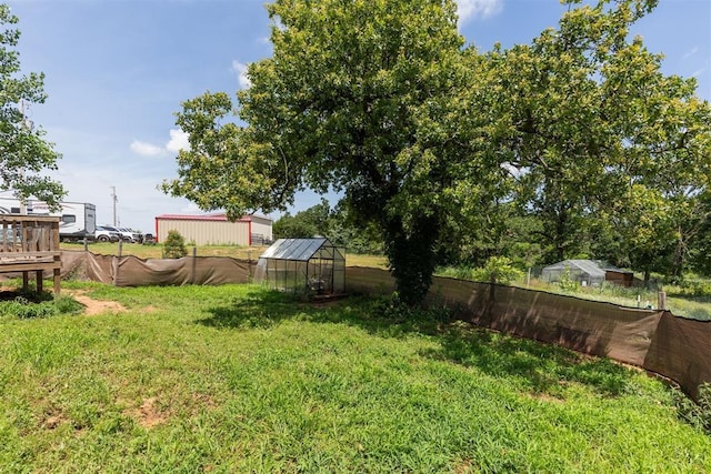 4040 Logan Hills Dr, Guthrie, OK 73044 - view of yard with a greenhouse and an outdoor structure