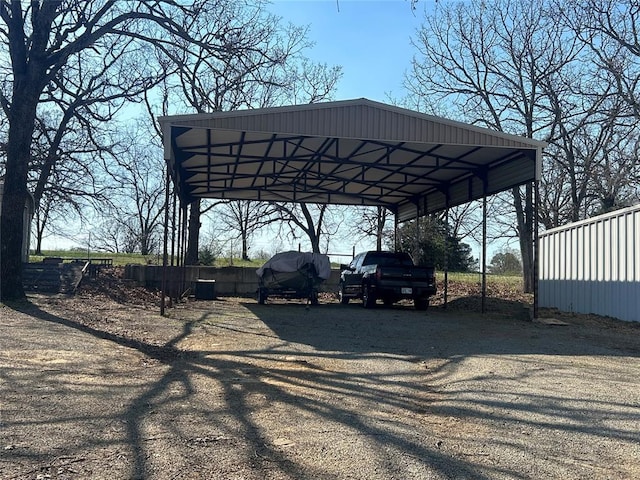273 N Elm St Unit 1, Eufaula, OK 74432 - view of parking with a detached carport and driveway