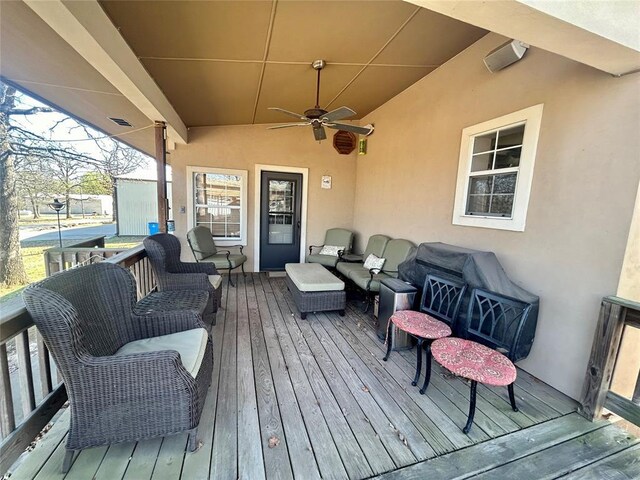 273 N Elm St Unit 1, Eufaula, OK 74432 - wooden deck featuring outdoor lounge area and ceiling fan