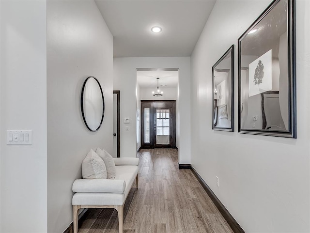 2436 NW 179th St, Edmond, OK 73012 - hall featuring wood finished floors and baseboards