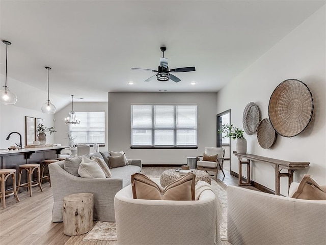 2436 NW 179th St, Edmond, OK 73012 - living room featuring ceiling fan, light wood finished floors, a chandelier, and recessed lighting