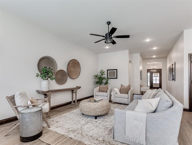 2436 NW 179th St, Edmond, OK 73012 - living area featuring wood finished floors, a ceiling fan, and recessed lighting