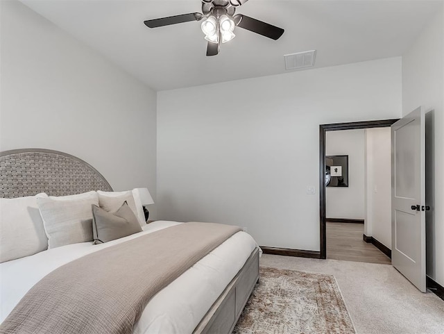 2436 NW 179th St, Edmond, OK 73012 - bedroom with light colored carpet and ceiling fan
