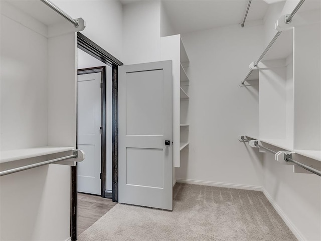 2436 NW 179th St, Edmond, OK 73012 - spacious closet featuring light carpet