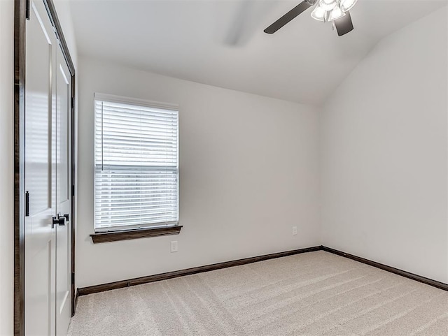 2436 NW 179th St, Edmond, OK 73012 - carpeted empty room featuring a ceiling fan and lofted ceiling