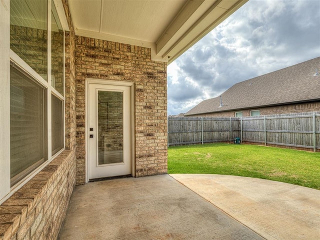2436 NW 179th St, Edmond, OK 73012 - fenced backyard featuring a patio